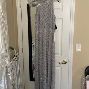 Beautiful dress to wear to a wedding. Brand new.